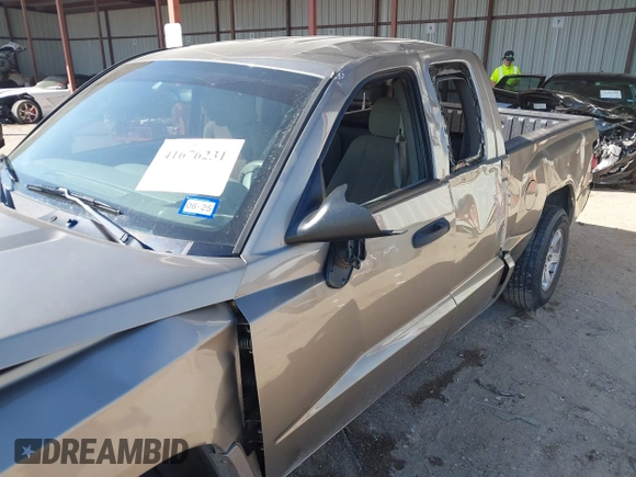 2006 Dodge Dakota SLT with VIN 1D7HE42K16S666071, listed as a IAAI auction lot 41676231 with 129,977 mi miles and . Bid and sale history available at carsss.com. Image 6.