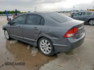 2010 Honda Civic LX with VIN 2HGFA1F52AH315977, listed as a Copart auction lot 54240115 with 217,883 mi miles and Salvage Title. Bid and sale history available at DreamBid. Image 2.