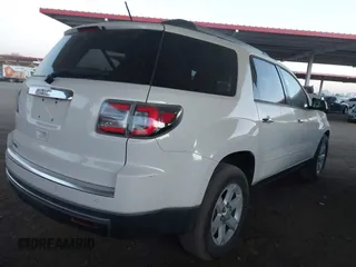 2014 GMC Acadia SLE with VIN 1GKKRNED5EJ198524, listed as a IAAI auction lot 41098195 with 132,572 mi miles and . Bid and sale history available at carsss.com. Image 4.