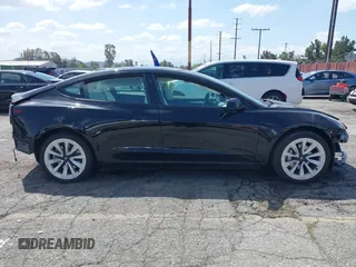 2022 Tesla Model 3 with VIN 5YJ3E1EA4NF316127, listed as a IAAI auction lot 41939191 with 30,857 mi miles. Bid and sale history available at carsss.com. Image 13.