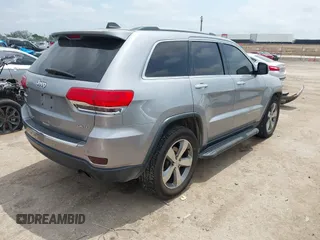 2014 Jeep Grand Cherokee Limited with VIN 1C4RJFBGXEC264334, listed as a IAAI auction lot 42127743 with 175,798 mi miles and . Bid and sale history available at DreamBid. Image 4.