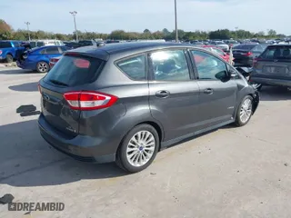 2018 Ford C-Max Hybrid SE with VIN 1FADP5AU1JL101145, listed as a IAAI auction lot 41453399 with 71,814 mi miles. Bid and sale history available at carsss.com. Image 4.