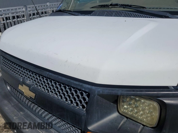 2013 Chevrolet Express Cargo z VIN 1GCWGFCA8D1175464, wystawiony jako IAAI lot #42409029 z przebiegiem 166 299 mil mil oraz . Historia ofert i sprzedaży dostępna na DreamBid. Obrazek 39.