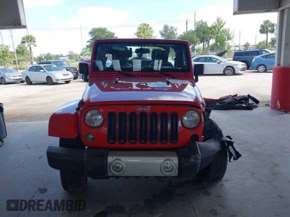 2014 Jeep Wrangler Unlimited Sahara z VIN 1C4BJWEGXEL179054, wystawiony jako IAAI lot #42151597 z przebiegiem 151 810 mil mil oraz . Historia ofert i sprzedaży dostępna na DreamBid. Obrazek 13.