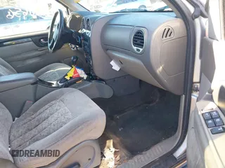 2004 GMC Envoy SLE with VIN 1GKDT13S642213710, listed as a IAAI auction lot 41680656 with 239,187 mi miles. Bid and sale history available at carsss.com. Image 5.