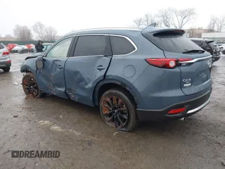 2023 Mazda CX-9 Carbon Edition with VIN JM3TCBDY1P0642597, listed as a IAAI auction lot 41568969 with Not Provided miles and . Bid and sale history available at carsss.com. Image 3.