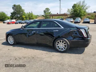 2015 Cadillac CTS Luxury RWD with VIN 1G6AR5SX2F0115311, listed as a Copart auction lot 58944915 with 34,764 mi miles and Salvage title. Bid and sale history available at DreamBid. Image 2.