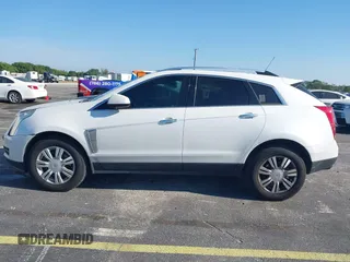 2016 Cadillac SRX Luxury Collection with VIN 3GYFNBE39GS548327, listed as a IAAI auction lot 41889611 with 140,670 mi miles. Bid and sale history available at carsss.com. Image 14.