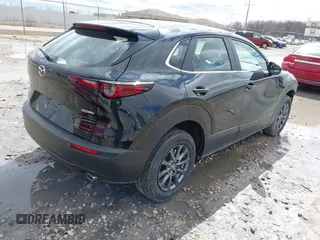 2024 Mazda CX-30 2.5 S with VIN 3MVDMBAM9RM654572, listed as a IAAI auction lot 41955821 with 23,660 mi miles. Bid and sale history available at carsss.com. Image 4.