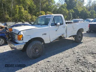 1990 Ford F-250 with VIN 1FTHF26H2LNA64235, listed as a Copart auction lot 74459134 with 249,821 mi miles and Salvage Title. Bid and sale history available at carsss.com. Image 1.