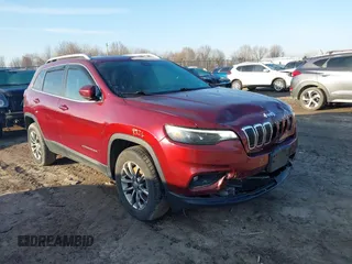 2019 Jeep Cherokee Latitude Plus with VIN 1C4PJMLB9KD410730, listed as a IAAI auction lot 41762344 with 82,097 mi miles. Bid and sale history available at carsss.com. Image 1.