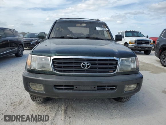 1999 Toyota Land Cruiser with VIN JT3HT05J9X0027448, listed as a Copart auction lot 77175814 with 0 mi miles and Salvage Title. Bid and sale history available at carsss.com. Image 5.