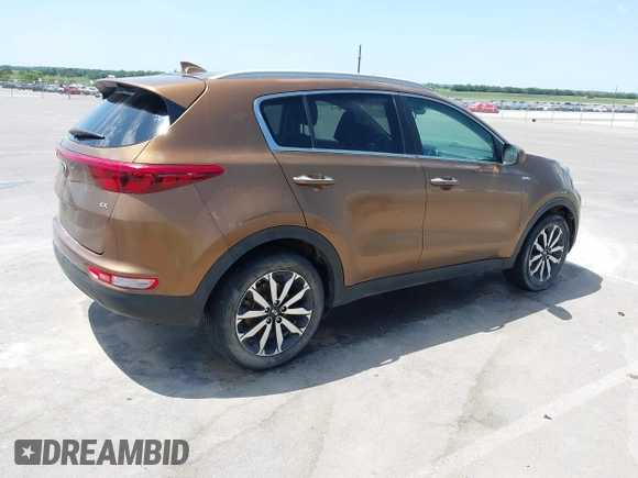 2017 Kia Sportage EX with VIN KNDPNCAC8H7264788, listed as a IAAI auction lot 42513924 with 166,239 mi miles and . Bid and sale history available at DreamBid. Image 4.