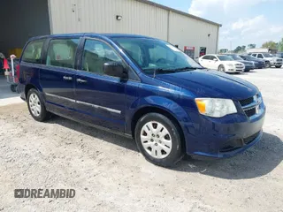2014 Dodge Grand Caravan SE with VIN 2C4RDGBG0ER229757, listed as a IAAI auction lot 42012395 with 166,158 mi miles and . Bid and sale history available at DreamBid. Image 1.