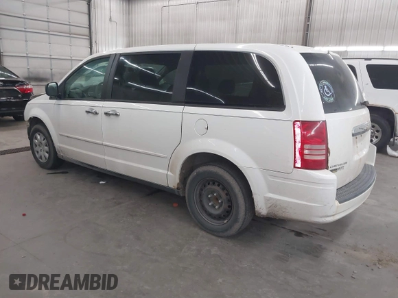 2008 Chrysler Town & Country LX with VIN 2A8HR44H78R671031, listed as a IAAI auction lot 41884932 with 300,502 mi miles. Bid and sale history available at carsss.com. Image 3.