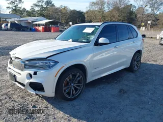 2015 BMW X5 xDrive50i z VIN 5UXKR6C58F0J78013, wystawiony jako IAAI lot #41335257 z przebiegiem Nie podano mil oraz . Historia ofert i sprzedaży dostępna na DreamBid. Obrazek 16.