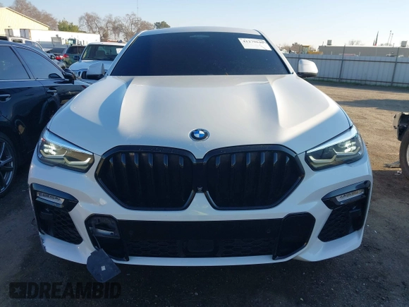 2021 BMW X6 sDrive40i z VIN 5UXCY4C06M9E16162, wystawiony jako IAAI lot #41279040 z przebiegiem 94 494 mil mil oraz . Historia ofert i sprzedaży dostępna na DreamBid. Obrazek 12.