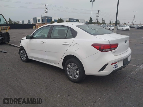 2021 Kia Rio LX with VIN 3KPA24AD3ME422560, listed as a IAAI auction lot 41005730 with 59,206 mi miles. Bid and sale history available at carsss.com. Image 3.