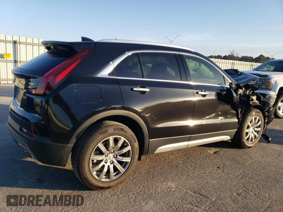 2020 Cadillac XT4 FWD Premium Luxury z VIN 1GYFZCR44LF056476, wystawiony jako Copart lot #43559495 z przebiegiem 51 076 mil mil oraz Szkody całkowita. Historia ofert i sprzedaży dostępna na DreamBid. Obrazek 3.