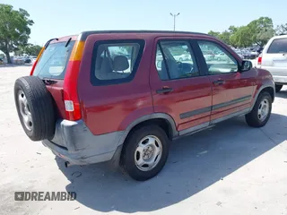 2004 Honda CR-V LX with VIN SHSRD68454U208090, listed as a IAAI auction lot 42282846 with 210,418 mi miles and . Bid and sale history available at DreamBid. Image 4.
