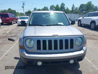 2015 Jeep Patriot Sport with VIN 1C4NJRBBXFD291890, listed as a IAAI auction lot 42570079 with 204,455 mi miles and . Bid and sale history available at DreamBid. Image 6.