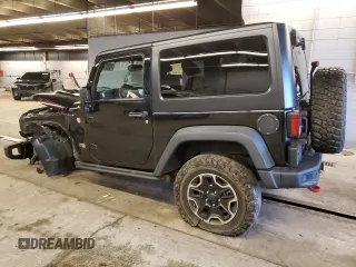2013 Jeep Wrangler Rubicon with VIN 1C4HJWCG6DL666540, listed as a Copart auction lot 79337404 with 130,448 mi miles and Salvage title. Bid and sale history available at DreamBid. Image 2.