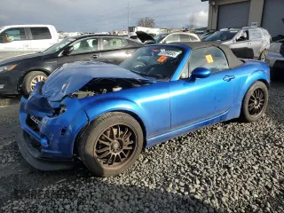 2006 Mazda MX-5 Miata Touring z VIN JM1NC25FX60119463, wystawiony jako Copart lot #47094695 z przebiegiem 76 257 mil mil oraz Szkoda całkowita • Salvage title. Historia ofert i sprzedaży dostępna na DreamBid. Obrazek 1.