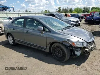 2011 Honda Civic LX with VIN 19XFA1F53BE036467, listed as a Copart auction lot 56015535 with Not Provided miles and Salvage Title. Bid and sale history available at DreamBid. Image 14.