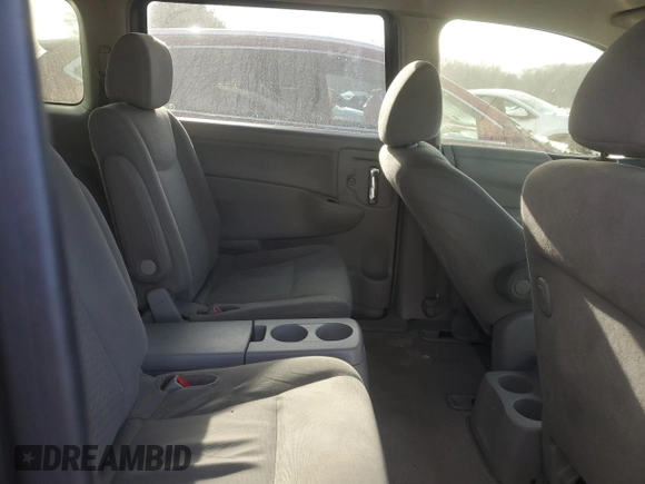 2015 Nissan Quest SV z VIN JN8AE2KP6F9130272, wystawiony jako Copart lot #42301055 z przebiegiem 282 779 mil mil oraz Tytuł czysty. Historia ofert i sprzedaży dostępna na DreamBid. Obrazek 11.