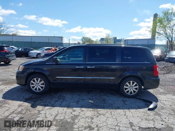 2015 Chrysler Town & Country Touring with VIN 2C4RC1BG5FR521339, listed as a IAAI auction lot 41984089 with 107,275 mi miles and . Bid and sale history available at DreamBid. Image 14.
