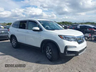 2021 Honda Pilot EX-L with VIN 5FNYF5H55MB039589, listed as a IAAI auction lot 41694567 with 58,685 mi miles. Bid and sale history available at carsss.com. Image 1.