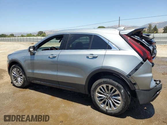 2024 Cadillac XT4 AWD Premium Luxury with VIN 1GYFZDR48RF153128, listed as a Copart auction lot 60712485 with 14,765 mi miles and Salvage title. Bid and sale history available at DreamBid. Image 2.