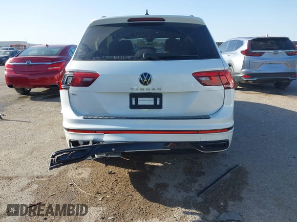 2024 Volkswagen Tiguan SE R-Line Black with VIN 3VVCB7AX0RM099863, listed as a IAAI auction lot 41851884 with 14,091 mi miles and . Bid and sale history available at DreamBid. Image 6.