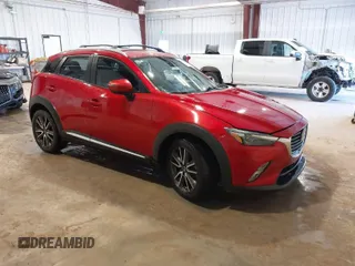 2016 Mazda CX-3 Grand Touring with VIN JM1DKBD71G0109950, listed as a IAAI auction lot 41759395 with 142,070 mi miles. Bid and sale history available at carsss.com. Image 1.