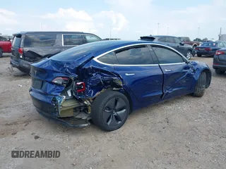 2019 Tesla Model 3 Mid Range z VIN 5YJ3E1EA8KF308947, wystawiony jako IAAI lot #39617997 z przebiegiem 70 831 mil mil oraz . Historia ofert i sprzedaży dostępna na DreamBid. Obrazek 4.