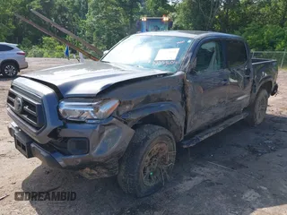 2022 Toyota Tacoma SR z VIN 3TYAX5GN5NT046897, wystawiony jako IAAI lot #42253604 z przebiegiem 69 246 mil mil oraz . Historia ofert i sprzedaży dostępna na DreamBid. Obrazek 6.