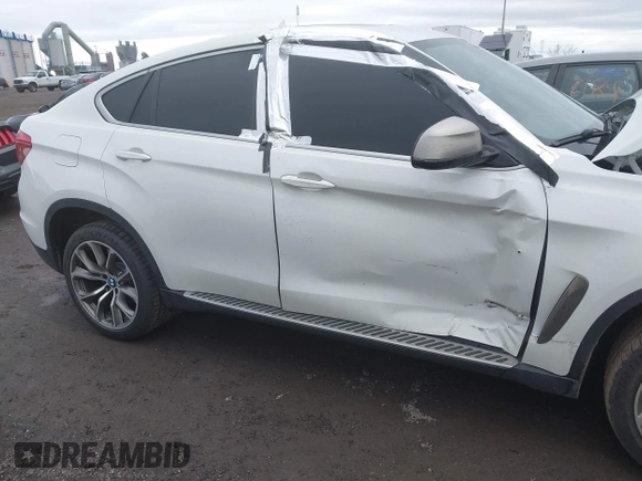 2015 BMW X6 xDrive35i with VIN 5UXKU2C57F0N77194, listed as a IAAI auction lot 41818860 with 105,579 mi miles and . Bid and sale history available at DreamBid. Image 6.
