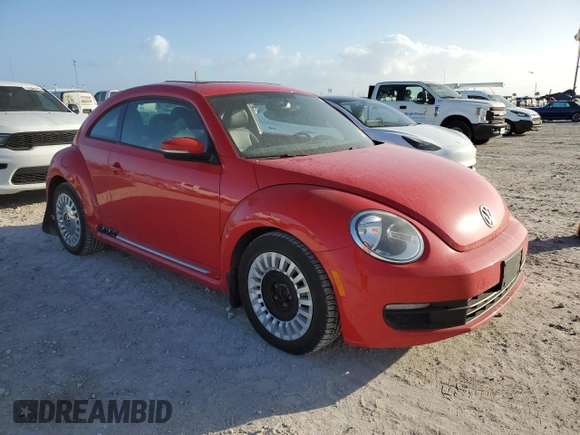 2014 Volkswagen Beetle 2.5L w/Sun with VIN 3VWJP7AT6EM624923, listed as a Copart auction lot 78641794 with 85,000 mi miles and Salvage Title. Bid and sale history available at DreamBid. Image 4.