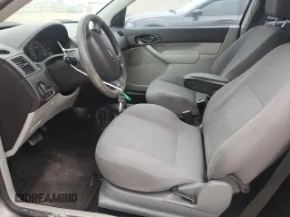 2007 Ford Focus S with VIN 1FAFP31N87W226088, listed as a Copart auction lot 88584555 with 83,896 mi miles and Salvage Title. Bid and sale history available at DreamBid. Image 7.