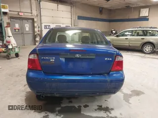 2006 Ford Focus S z VIN 1FAFP34N66W232191, wystawiony jako IAAI lot #42319916 z przebiegiem 51 438 mil mil oraz . Historia ofert i sprzedaży dostępna na DreamBid. Obrazek 15.