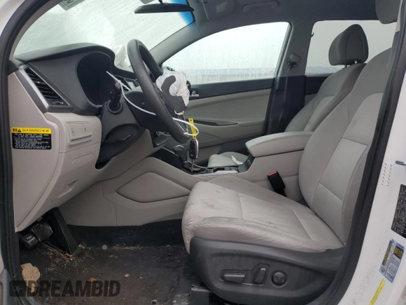 2018 Hyundai Tucson SEL with VIN KM8J3CA41JU712523, listed as a Copart auction lot 56929885 with 91,131 mi miles and Salvage title. Bid and sale history available at DreamBid. Image 7.
