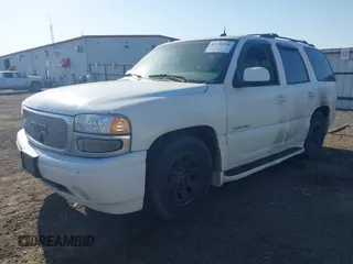 2003 GMC Yukon Denali z VIN 1GKEK63U73J336989, wystawiony jako IAAI lot #42170538 z przebiegiem Nie podano mil oraz . Historia ofert i sprzedaży dostępna na DreamBid. Obrazek 2.