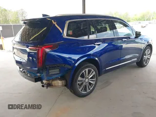 2025 Cadillac XT6 FWD Premium Luxury with VIN 1GYKPCRS5SZ119357, listed as a IAAI auction lot 42087218 with 11,352 mi miles. Bid and sale history available at carsss.com. Image 4.