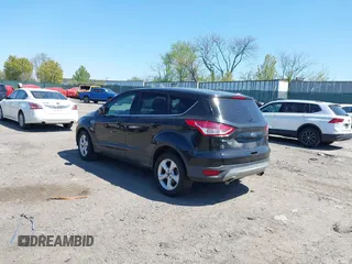 2015 Ford Escape SE with VIN 1FMCU9GX3FUC14020, listed as a IAAI auction lot 42069921 with 111,113 mi miles. Bid and sale history available at carsss.com. Image 3.