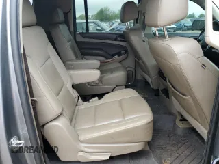 2018 Chevrolet Suburban Premier with VIN 1GNSCJKC5JR293962, listed as a Copart auction lot 50641835 with 137,598 mi miles and Salvage Title. Bid and sale history available at DreamBid. Image 11.