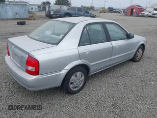 2000 Mazda Protege DX z VIN JM1BJ2225Y0211691, wystawiony jako IAAI lot #42464257 z przebiegiem 176 457 mil mil oraz . Historia ofert i sprzedaży dostępna na DreamBid. Obrazek 4.