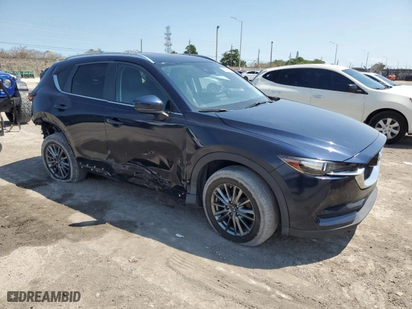2017 Mazda CX-5 Touring with VIN JM3KFACL8H0216166, listed as a Copart auction lot 50919145 with NaN miles and Salvage Title. Bid and sale history available at carsss.com. Image 4.