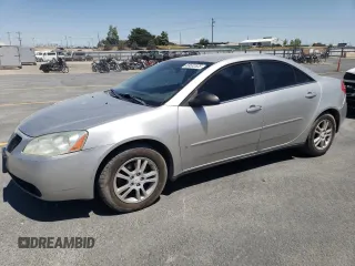 2006 Pontiac G6 6-Cyl z VIN 1G2ZG558964213226, wystawiony jako Copart lot #59532525 z przebiegiem 159 389 mil mil oraz Szkoda całkowita • Salvage title. Historia ofert i sprzedaży dostępna na DreamBid. Obrazek 1.
