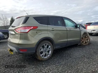 2013 Ford Escape SEL with VIN 1FMCU9H94DUD55370, listed as a Copart auction lot 52199415 with 79,462 mi miles and Salvage Title. Bid and sale history available at DreamBid. Image 3.