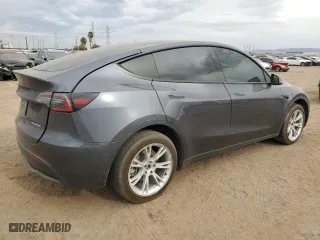 2023 Tesla Model Y Long Range with VIN 7SAYGDEE4PF900781, listed as a Copart auction lot 48164905 with 28,859 mi miles and Salvage Title. Bid and sale history available at carsss.com. Image 3.